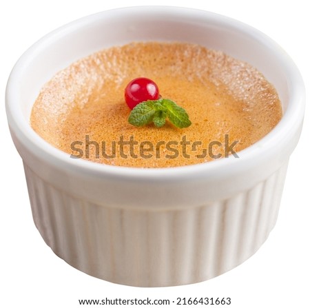 Butternut squash souffle in white ramekin, isolated on white background.