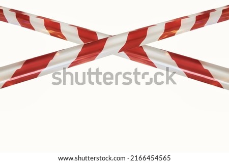 Red white lines of barrier cross tape prohibit passage, on white isolate background. Barrier that prohibits traffic. Danger unsafe area warning tape do not enter. Concept no entry Royalty-Free Stock Photo #2166454565