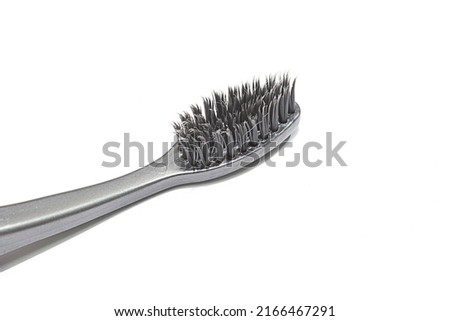 Toothbrush is very useful for cleaning plaque and food residue on teeth Royalty-Free Stock Photo #2166467291