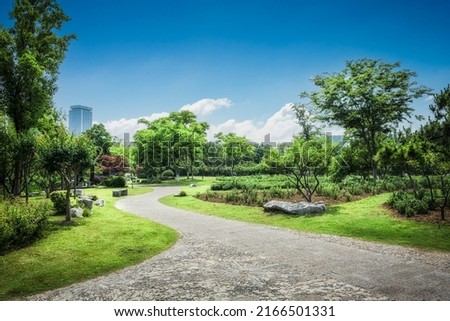 Nice green forest landscape in the city Royalty-Free Stock Photo #2166501331