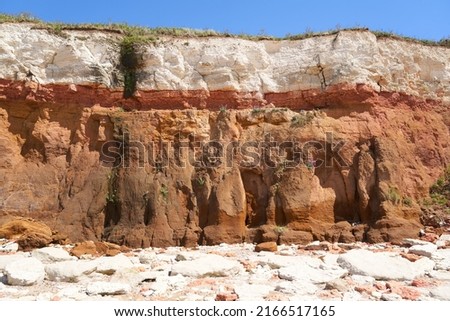 Coastal cliff geological layers example                            