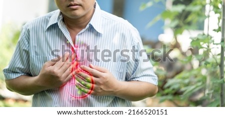 image of design humans stomach graphic with suffering men  Body ,GERD, Acid Reflux Disease Symptoms Or Heartburn, Concept With Healthcare And Medicine Royalty-Free Stock Photo #2166520151