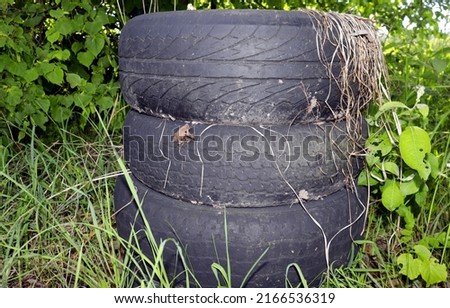 old car tires in nature