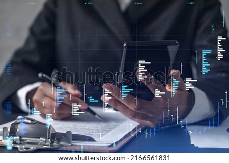 African American businesswoman in formal wear is signing the contract to invest money in stock market. Internet trading and wealth management. Checking the details of transaction at smart phone. Forex