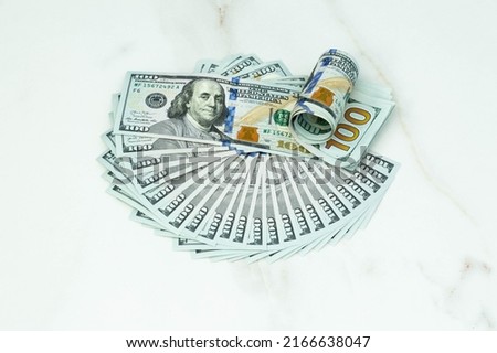 New dollars edition banknotes on a marble background 