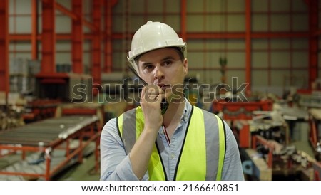 Industrial factory and manufacturing concept. Engineering or worker working for production of goods.