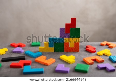 Creative idea solution - business concept, jigsaw puzzle close up. Leadership and teamwork strategy success. Royalty-Free Stock Photo #2166644849