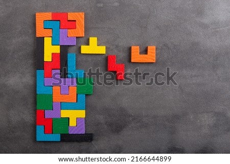 Creative idea solution - business concept, jigsaw puzzle close up. Leadership and teamwork strategy success. Royalty-Free Stock Photo #2166644899