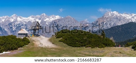 A picture of the Kamnik–Savinja Alps on the background of the Velika Planina's ski lift station.