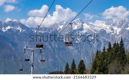 A picture of the Kamnik–Savinja Alps on the background of the Velika Planina's ski lifts.