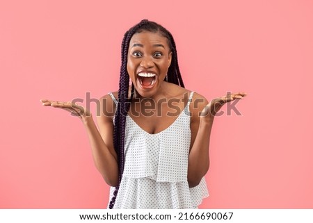 Portrait of young black woman feeling excited, shouting OMG or WOW, expressing emotion of joy on pink studio background. Unbelievable offer, shocking news, huge sale or discount Royalty-Free Stock Photo #2166690067