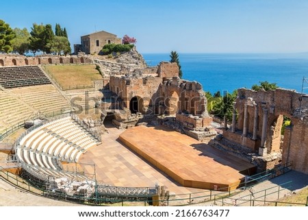 Ruins of the ancient Greek theater in Taormina, Sicily, Italy in a beautiful summer day Royalty-Free Stock Photo #2166763477