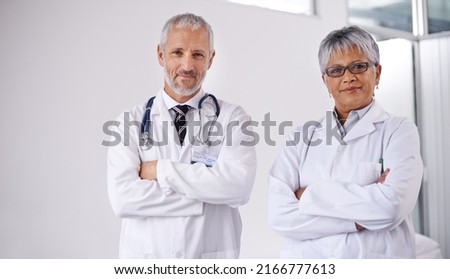 Consulting a colleague for a second opinion. Shot of two doctors working together in a hospital. Royalty-Free Stock Photo #2166777613