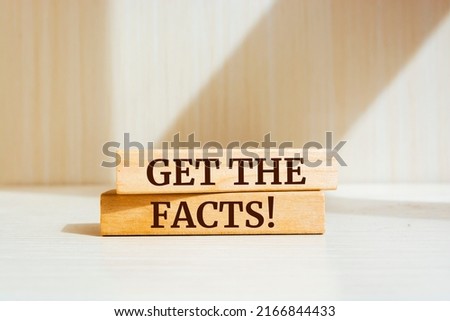 Wooden blocks with words 'Get the facts'.