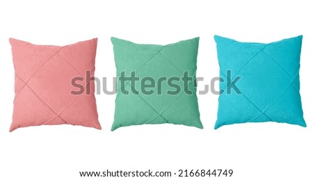 Three pillow isolated on white background with clipping path. Close-up of red, green and blue  pillow isolated on a white background. Pillow for sleeping. Royalty-Free Stock Photo #2166844749