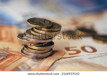 euro coins placed on top of each other Royalty-Free Stock Photo #2166919143