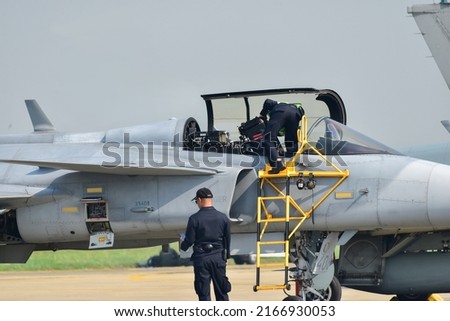 Inspection of fighter aircraft systems Royalty-Free Stock Photo #2166930053