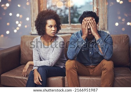 Every marriage has its bad days.... Shot of a couple having relationship problems at home. Royalty-Free Stock Photo #2166951987