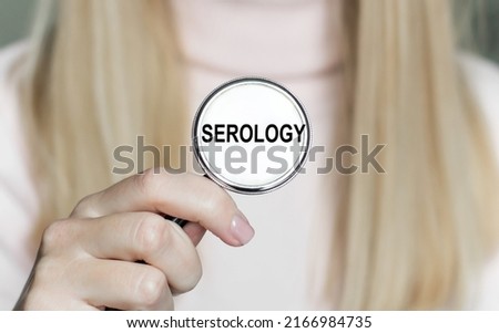 The word SEROLOGY on stethoscope in girls doctor, medical concept