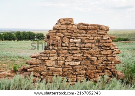 Wall of ancient building, old ruined wall of an antique building Royalty-Free Stock Photo #2167052943