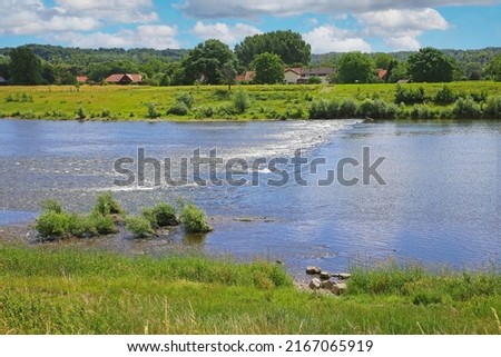 View from belgian border over river Maas rapids for rafting on dutch riverfront, idyllic rural landscape - Maasvallei, Limburg, Netherlands and Belgium, Uikhoven, Geulle Royalty-Free Stock Photo #2167065919