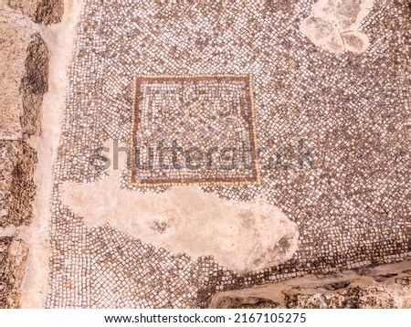 Mosaic floor detail. The ruins of the city of the Byzantine period. Khirbet CASTRA. Haifa, Israel. Royalty-Free Stock Photo #2167105275