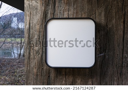White Square Signboard On The Wooden Wall, 3d Rendering