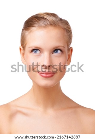What should I wear today. Studio shot of a gorgeous young blond woman. Royalty-Free Stock Photo #2167142887