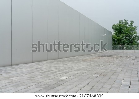 empty ground floor in front of modern architecture exterior. Royalty-Free Stock Photo #2167168399