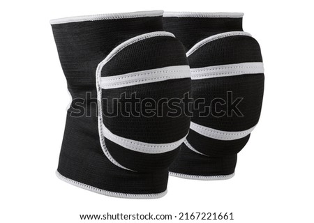 a pair of voluminous black knee pads, for sports games or for dancing, with shock-absorbing pillows, on a white background, isolate Royalty-Free Stock Photo #2167221661