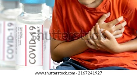 Teen nature boy suffering from chest pain side effect of covid-19 vaccinated. Myocarditis and Pericarditis after Receipt of mRNA COVID-19 Vaccines Among Adolescents and Young Adults concept.
 Royalty-Free Stock Photo #2167241927