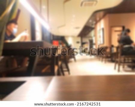 Defocused abstract background of a coffee room.