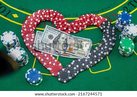 beautiful dollar poker gambling with colored chips, cards and green table. Money poker concept