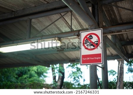 "Turn off your engine" caution sign metal plate which is installed at the car parking lot. Sign for transportation.