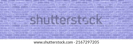 Lavender color rough brick wall texture. Pastel purple old masonry wide wallpaper. Abstract vintage panoramic textured background