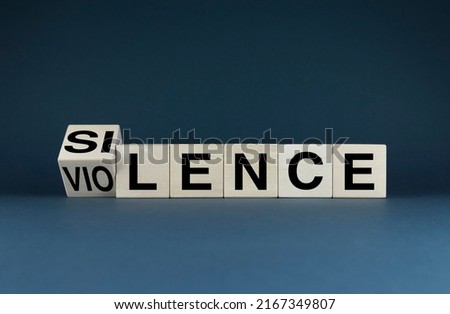 Silence - Violence. Cubes form the words Silence - Violence. Silence - Violence concept Royalty-Free Stock Photo #2167349807