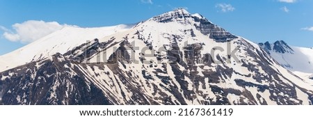 beautiful panorama of a snowcapped mountain, Kazbegi, Georgia. High quality photo