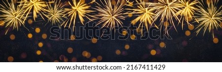 HAPPY NEW YEAR - Celebration New Year's Eve, Silvester 2023 holiday background banner panorama long greeting card - Golden firework fireworks and bokeh lights on dark night sky