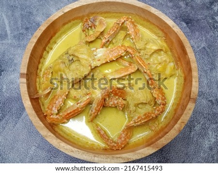 Crab Coconut Milk Soup or Kepiting Kuah Santan. Indonesian food. Royalty-Free Stock Photo #2167415493