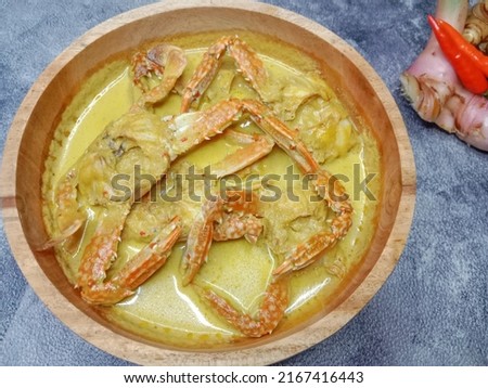 Crab Coconut Milk Soup or Kepiting Kuah Santan. Indonesian food. Royalty-Free Stock Photo #2167416443