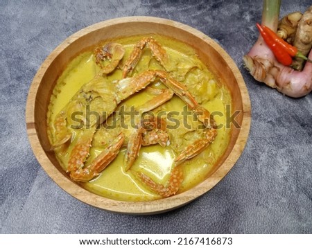 Crab Coconut Milk Soup or Kepiting Kuah Santan. Indonesian food. Royalty-Free Stock Photo #2167416873