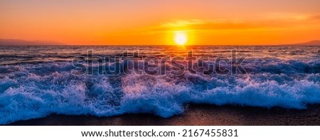 A Sunrise Back Lit Ocean Wave Is Breaking On The Beach Shore In High Resolution Banner Image Format