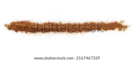 Cinnamon line powder isolated on white, top view  Royalty-Free Stock Photo #2167467329