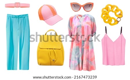 Female summer clothing set isolated on white. Collection of women clothes.Girl's apparel collage. Pink, yellow, blue colors garment. Beautiful elegant outlook. Royalty-Free Stock Photo #2167473239