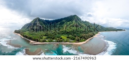 A mysterious island in the ocean. Island shoreline panorama. Island seacoast landscape. Mysterious island panoramic landscape Royalty-Free Stock Photo #2167490963