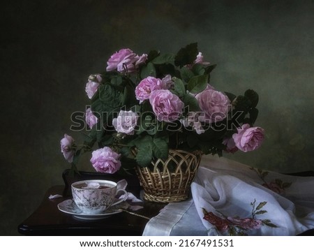Still life with bouquet of pink roses and tea cup