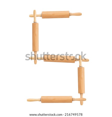 Number 5 formed from the rolling pins on a white background 