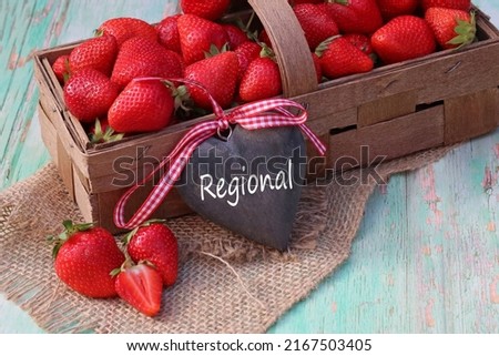 A basket of ripe, locally grown strawberries.