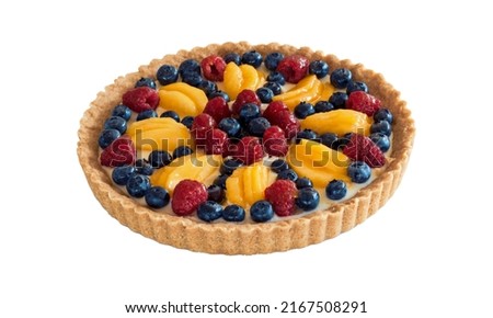 Fresh homemade pretty fruit tart with peaches, blueberries and strawberries on top Royalty-Free Stock Photo #2167508291