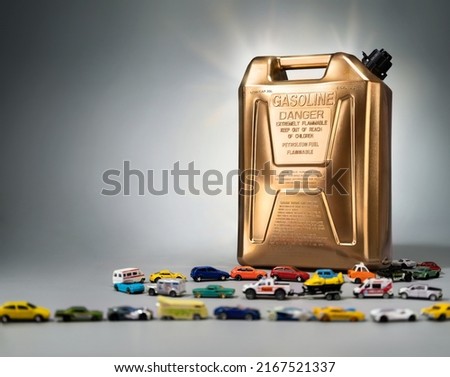 Golden fuel can with queue for gas station on grey background